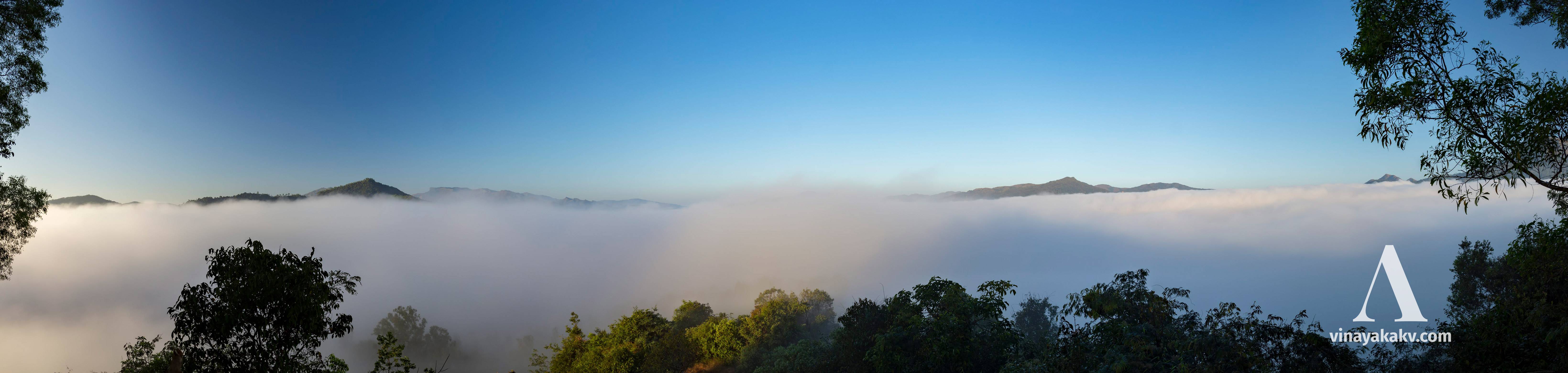 Panorama of a morning mist. The inversion layer is at around 900m altitude. You can see the sunlit part of the layer at center breaking and moving up. The dismantling of this layer could take around an hour.
