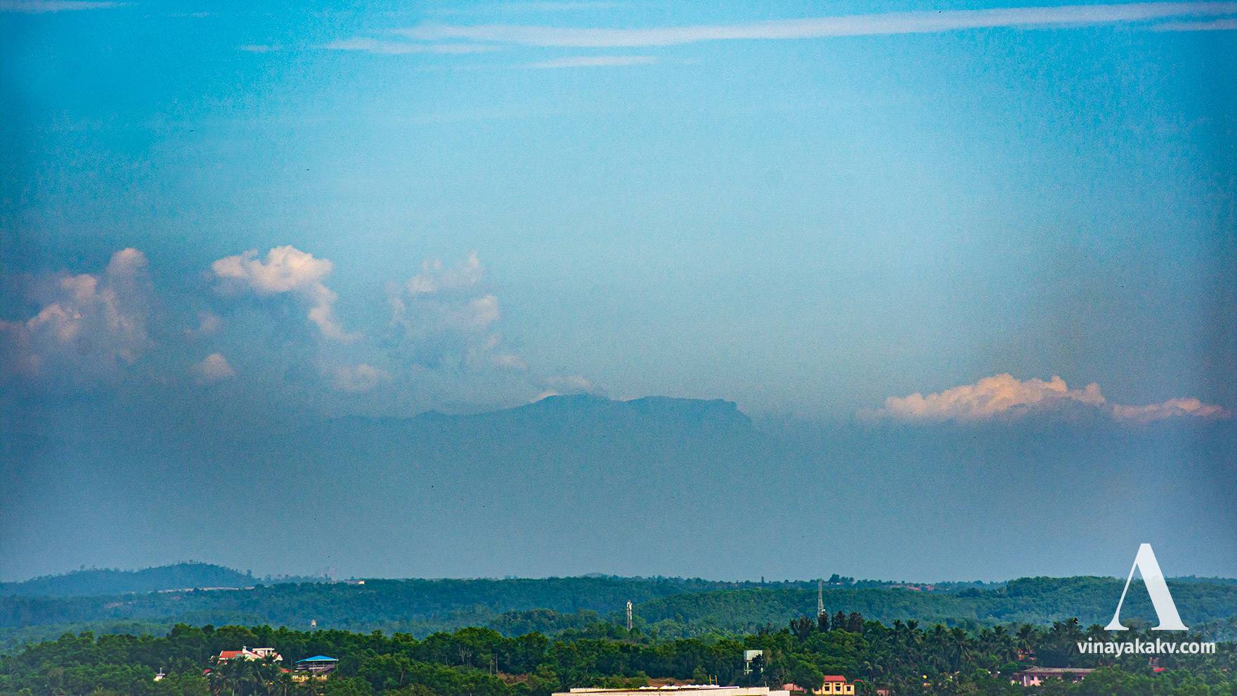 If the haze line is low, it enables to see the things above it -- In this case, the Kuduremukha mountain.