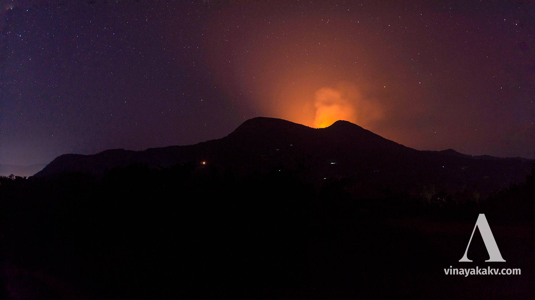 Grassland fire viewed from a distance at night